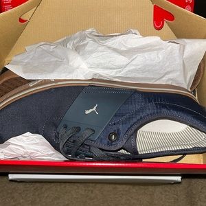 Navy Puma ElAce in size 12. Great looking casual or skate shoe. Never worn NIB